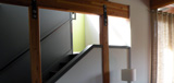 modern_interiors_71st-stairhalfwall-glulamposts