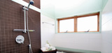modern_bathrooms_green3-tiledshower-glass-unglazedbrown-ribbedceramic